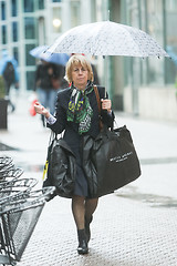 Image showing Woman walking on street