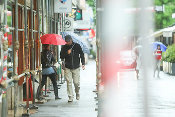 Image showing People on rainy day