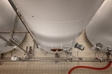 Image showing Large industrial white silos in modern factory