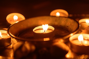 Image showing Candles burning at altar