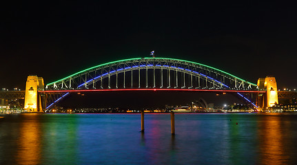 Image showing Sydney Harbour Bridge illuminated in colours for Vivid Sydney