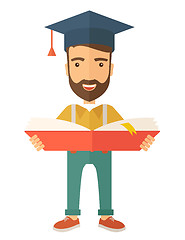 Image showing Man standing with graduation cap.