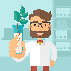 Image showing Chemist with tube and eco leaves.