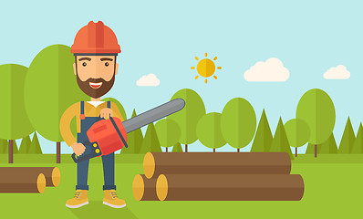 Image showing Lumberjack cuts a tree by chainsaw