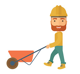 Image showing Gardener pushing a wheelbarrow.