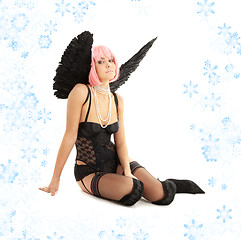 Image showing black lingerie angel with pink hair and snowflakes