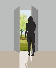 Image showing Woman in open door