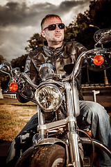 Image showing Biker on a motorcycle