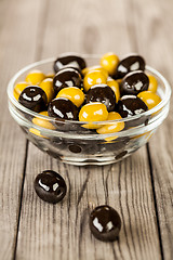 Image showing Olives on a wooden table