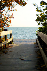 Image showing shaded boardwalk leading to beach