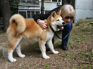 Image showing Lady and dog