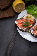 Image showing Sandwich with salmon for breakfast