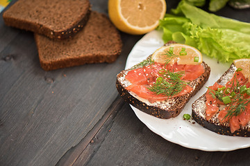 Image showing Sandwich with salmon for breakfast