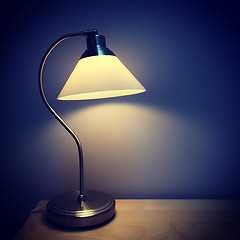 Image showing Table lamp in a dark room