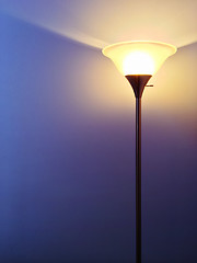 Image showing Bright lamp on purple background