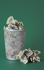 Image showing Wasted money - Dollar bills