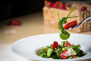 Image showing Fresh Salad with strawberries, goat cheese and shrimps