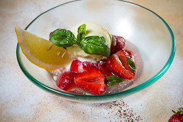 Image showing Ice cream with fresh strawberries