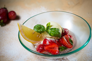 Image showing Ice cream with fresh strawberries