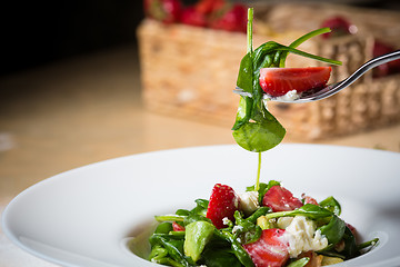 Image showing Fresh Salad with strawberries, goat cheese and shrimps