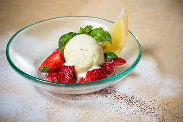 Image showing Ice cream with fresh strawberries