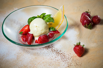 Image showing Ice cream with fresh strawberries