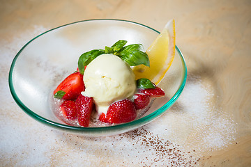 Image showing Ice cream with fresh strawberries