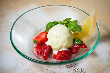 Image showing Ice cream with fresh strawberries