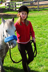 Image showing Girl and pony