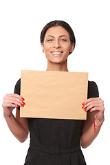 Image showing Smiling business woman showing envelope