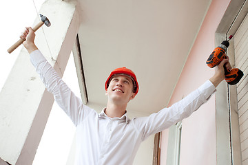 Image showing joyful repairman