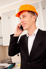 Image showing engineer talking on the phone