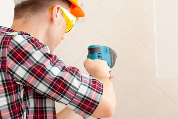 Image showing worker with rock-drill