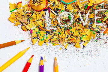 Image showing The word LOVE on the background of pencil shavings