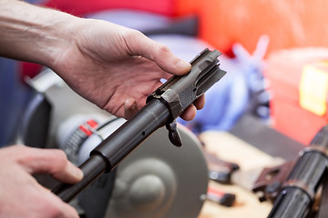 Image showing repair of the old German submachine gun MP-38