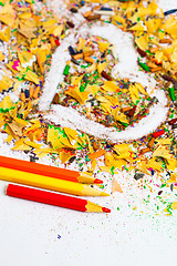 Image showing heart, three pencils and colored wooden shavings