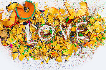 Image showing The word Love on colored pencil shavings