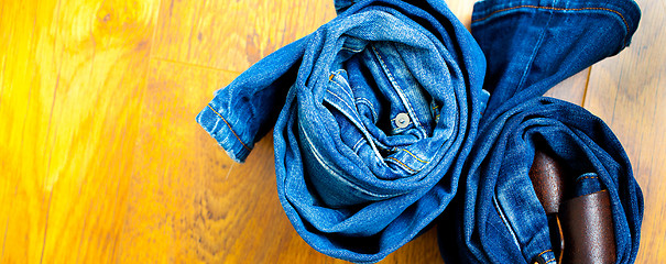 Image showing Jeans trousers rolls