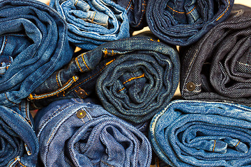 Image showing jeans trousers stack