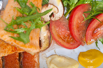 Image showing grilled samon filet with vegetables salad