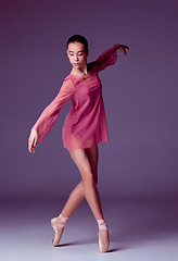 Image showing Young ballerina dancer showing her techniques