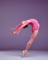 Image showing Young ballerina dancer showing her techniques