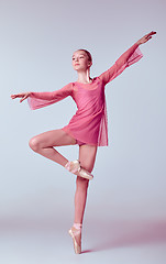 Image showing Young ballerina dancer showing her techniques