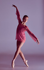 Image showing Young ballerina dancer showing her techniques