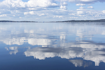 Image showing Reflection of clouds on lake water