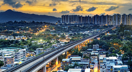 Image showing hong kong urban downtown and sunset speed train