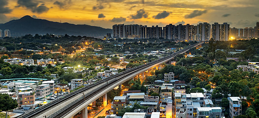 Image showing hong kong urban downtown and sunset speed train