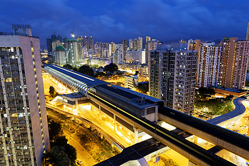 Image showing hong kong urban downtown and high speed train at night