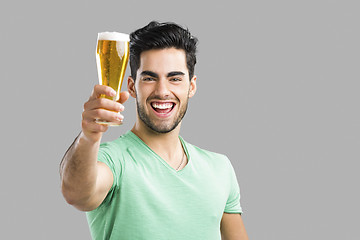 Image showing Young man drinking beer