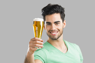 Image showing Young man drinking beer